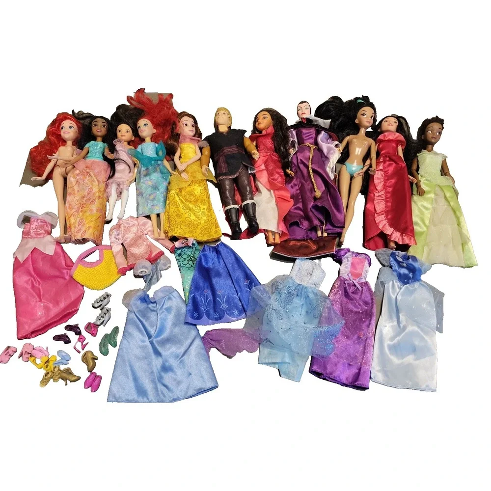Disney Barbie dolls with extra dresses shoes etc... Mixed lot